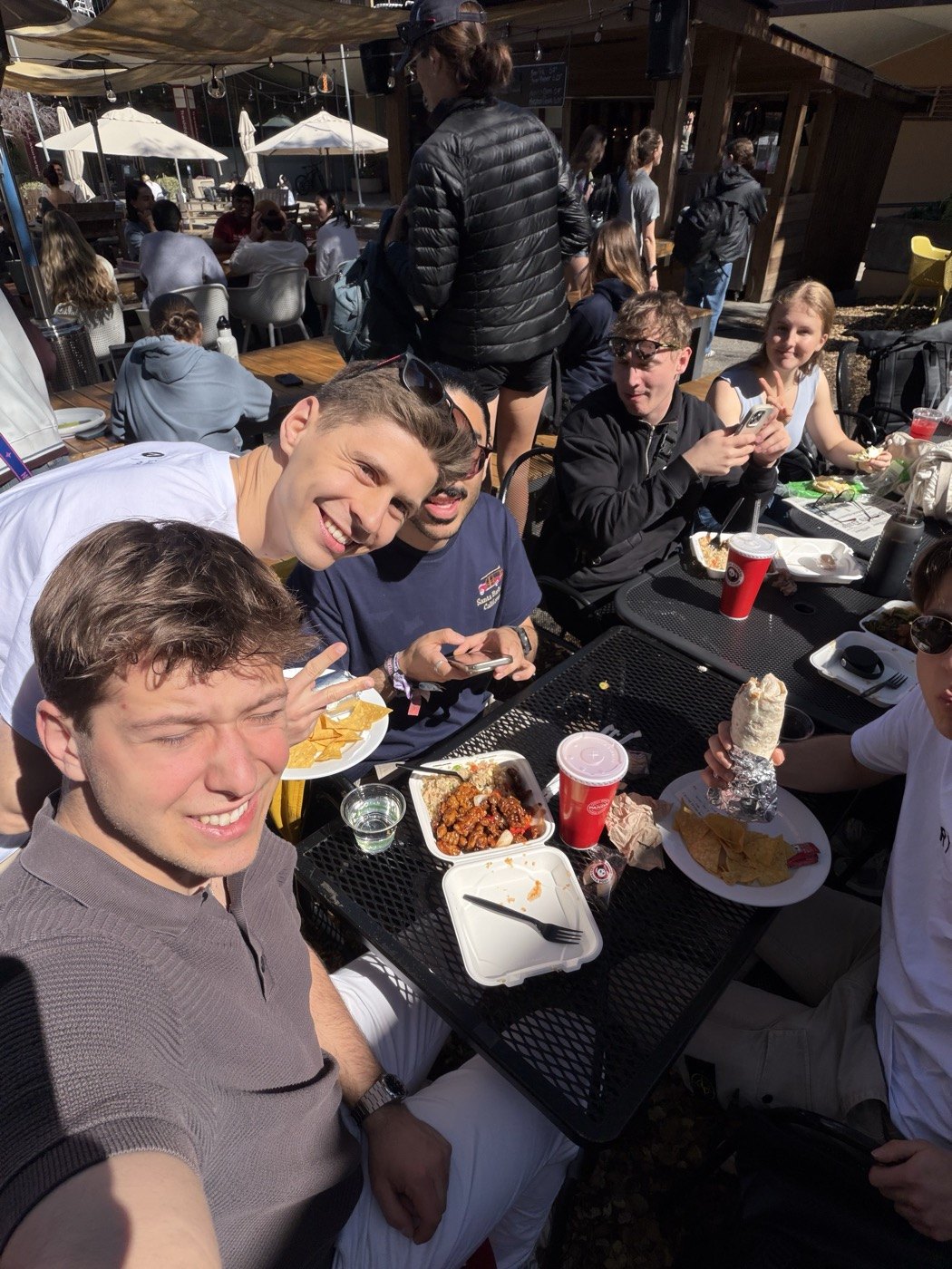 Trip participants sharing a meal